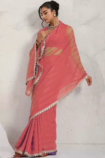 Red elegant printed georgette saree with blouse piece