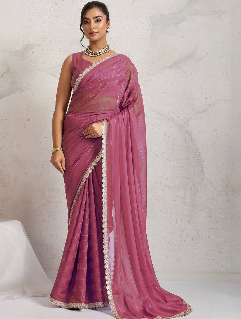 Pink elegant printed georgette saree with blouse piece