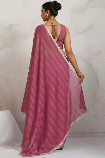 Pink elegant printed georgette saree with blouse piece