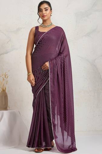 Purple elegant printed georgette saree with blouse piece