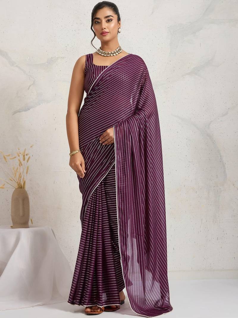 Purple elegant printed georgette saree with blouse piece