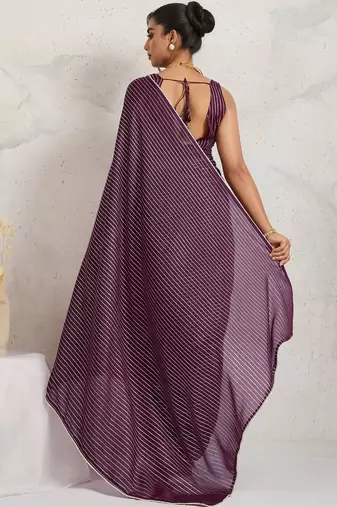 Purple elegant printed georgette saree with blouse piece