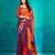 Orange printed satin fashion saree with blouse piece