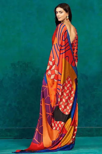 Orange printed satin fashion saree with blouse piece