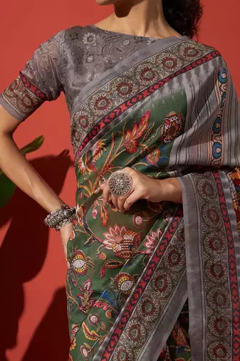 Green elegant printed silk cotton saree with blouse piece
