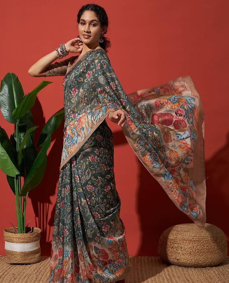 Green elegant printed silk cotton saree with blouse piece