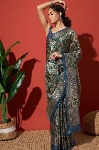 Green printed tissue festive wear saree with blouse piece