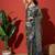 Green printed tissue festive wear saree with blouse piece