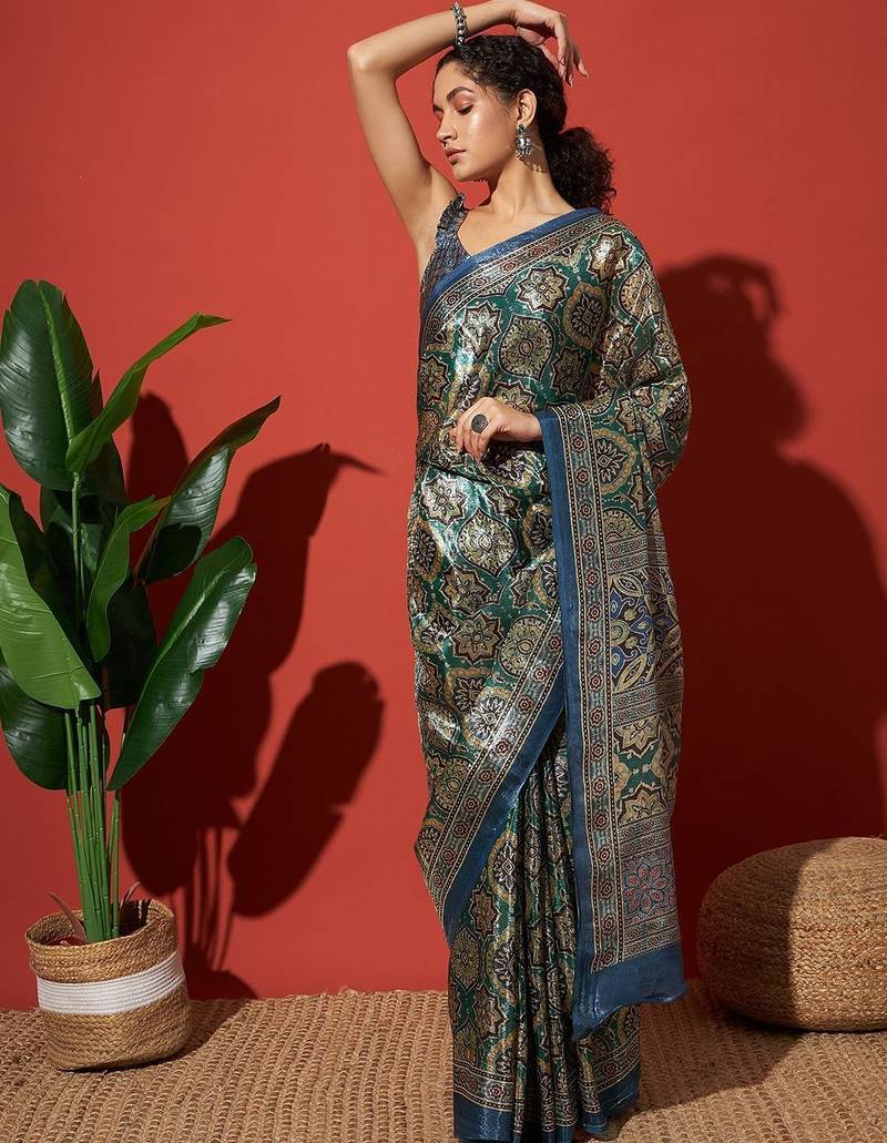 Green printed tissue festive wear saree with blouse piece
