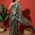 Green printed tissue festive wear saree with blouse piece
