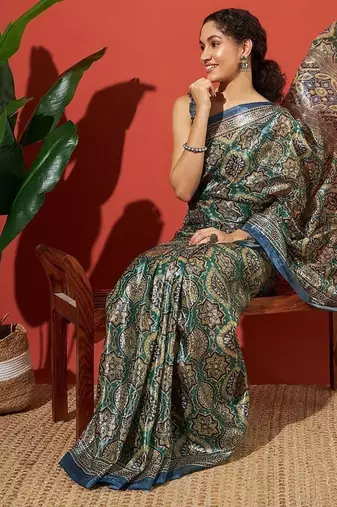Green printed tissue festive wear saree with blouse piece
