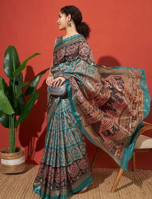 Turquoise blue printed tissue festive wear saree with blouse piece 1