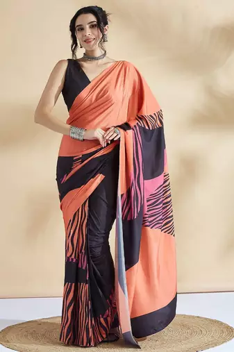 Orange printed crepe casual saree with blouse piece
