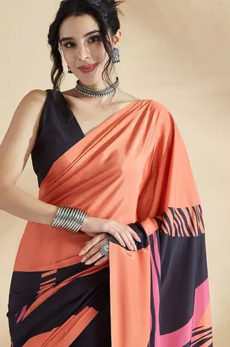 Orange printed crepe casual saree with blouse piece