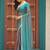 Teal plain chiffon designer saree with blouse piece