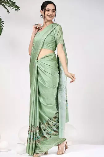 Green printed silk blend ethnic saree with blouse piece
