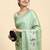 Green printed silk blend ethnic saree with blouse piece