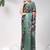 Green printed silk blend ethnic saree with blouse piece