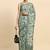 Green printed satin fashion saree with blouse piece