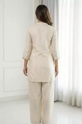 Cream chinnon silk kurta palazzo set with beads embroidery