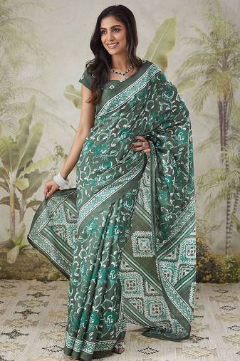 Green printed blended cotton designer saree with blouse piece
