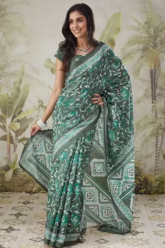 Green printed blended cotton designer saree with blouse piece