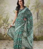 Green printed blended cotton designer saree with blouse piece