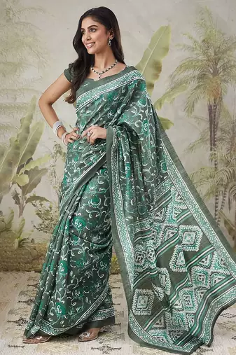 Green printed blended cotton designer saree with blouse piece