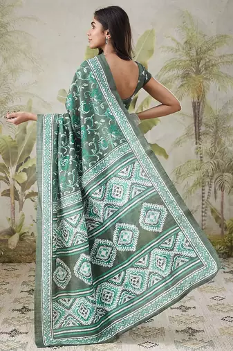 Green printed blended cotton designer saree with blouse piece