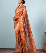 Orange printed silk blend ethnic saree with blouse piece