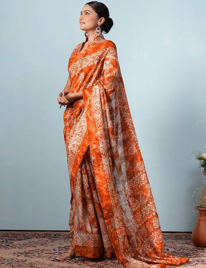 Orange printed silk blend ethnic saree with blouse piece