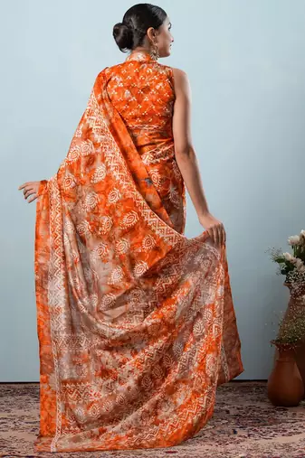 Orange printed silk blend ethnic saree with blouse piece