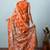 Orange printed silk blend ethnic saree with blouse piece