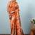Orange printed silk blend ethnic saree with blouse piece
