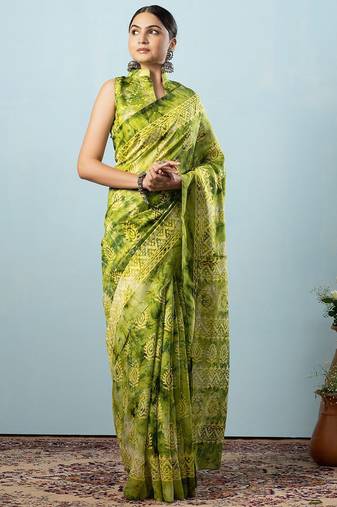 Green printed silk blend ethnic saree with blouse piece