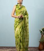 Green printed silk blend ethnic saree with blouse piece