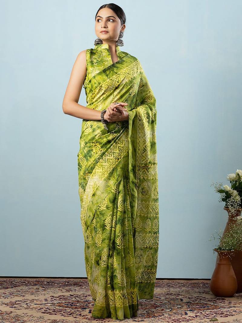 Green printed silk blend ethnic saree with blouse piece