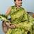 Green printed silk blend ethnic saree with blouse piece