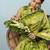 Green printed silk blend ethnic saree with blouse piece
