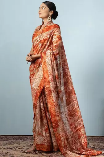 Orange printed silk blend ethnic saree with blouse piece