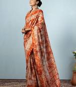 Orange printed silk blend ethnic saree with blouse piece