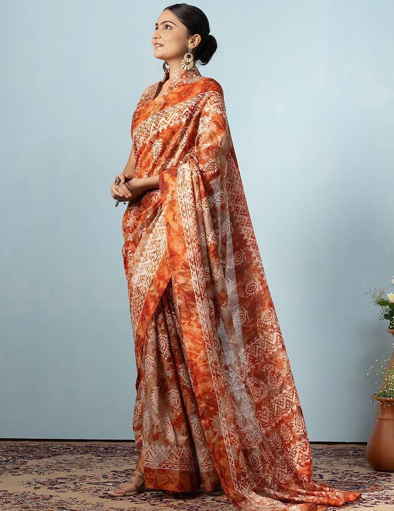 Orange printed silk blend ethnic saree with blouse piece