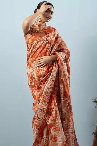Orange printed silk blend ethnic saree with blouse piece