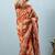 Orange printed silk blend ethnic saree with blouse piece