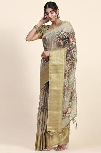 Green printed art silk traditional saree with blouse piece