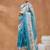 Turquoise blue printed silk blend ethnic saree with blouse piece