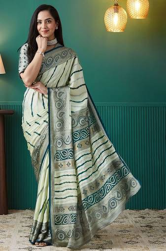 Green printed brasso casual saree with blouse piece