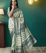 Green printed brasso casual saree with blouse piece