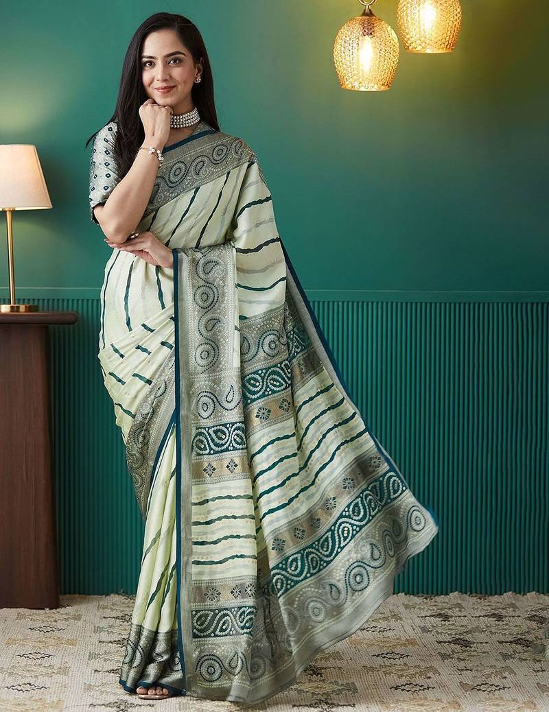 Green printed brasso casual saree with blouse piece