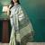 Green printed brasso casual saree with blouse piece